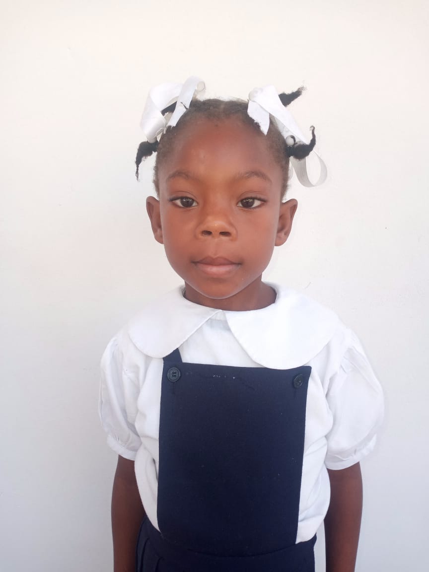 Christ-Mylove Is six years old. She has a bubbly personality and is always a helper.