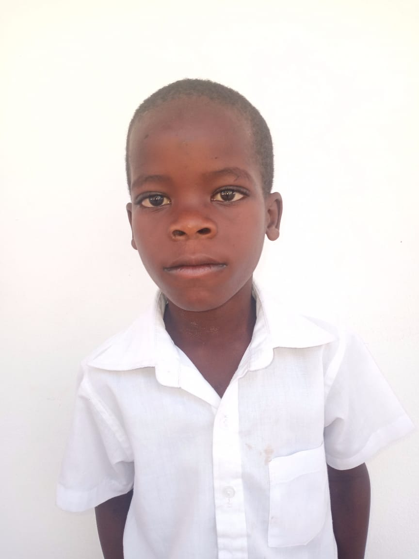 Dimitri Is five years old. He is the second of three children and is beginning to show an interest in writing.