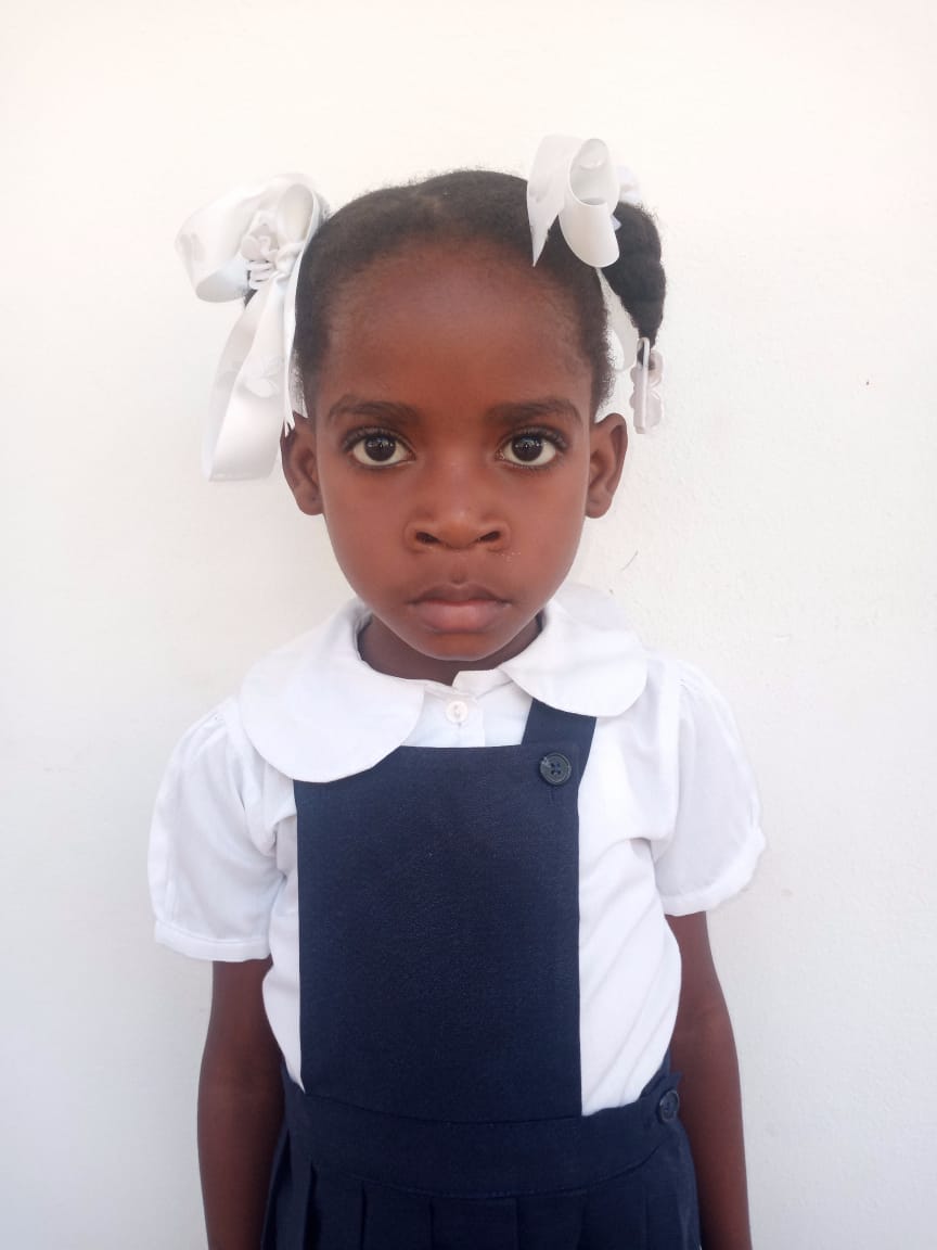 Lousemy Is four years old and is super shy. She loves learning.