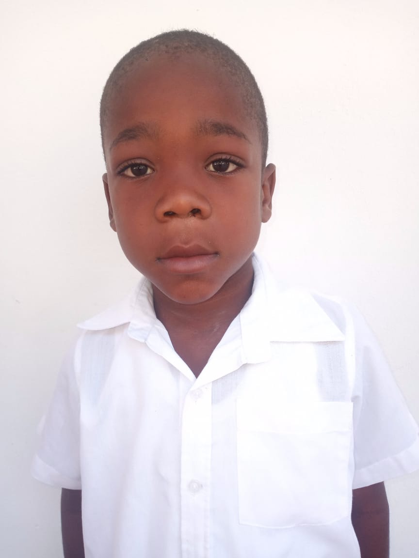 Marcelin Is six years old, the oldest of three in his family. He likes drawing, especially cars, and motorcycles.